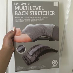 Back stretcher with foam back piece